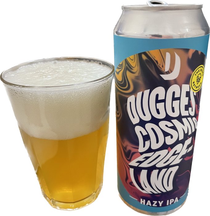 Ett glas med skummande öl och en färgglad burk märkt "hazy IPA".