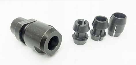 Fyra svarta industridelar, inklusive en tätning och kopplingshylsor, mot vit bakgrund.