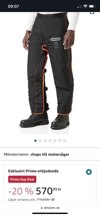 Säkerhetsbyxor för motorsågsanvändning, svarta med orangea detaljer, rabatt på Amazon. Prissänkning visas.