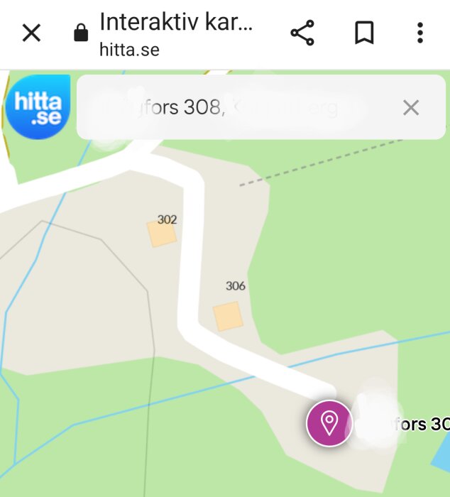Skärmdump av en karta från "hitta.se" med vägar, byggnader och en positionsmarkör.
