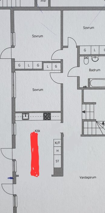 Arkitektonisk planritning av en lägenhet med markerat kök och text på svenska.