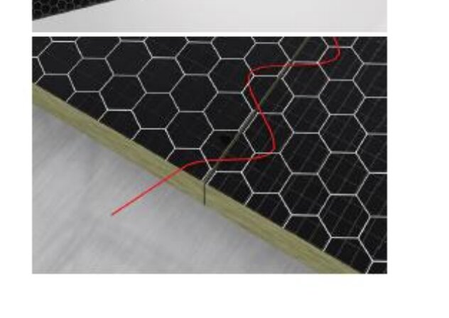 Hexagonalt svart kakel, träkant, röd ledning, grå betonggolv, inte fullständigt monterad.