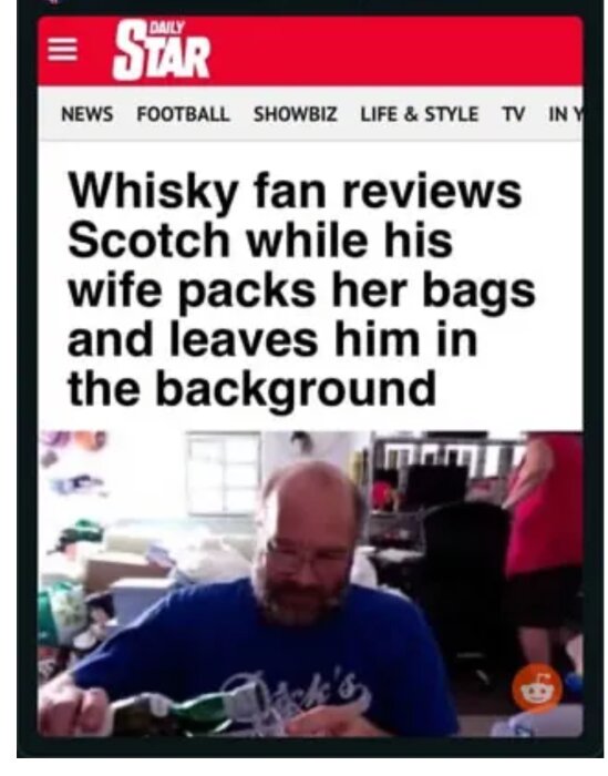 Skärmklipp: Man recenserar whisky, kvinna packar i bakgrunden, humoristisk situation antyds, nyhetsartikel, "Daily Star" rubrik.