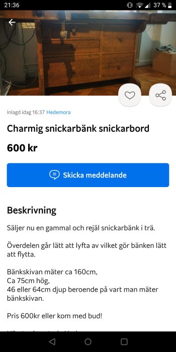 Gammal träsnickarbänk med skruvstäd, lådor, skugga på golvet, till salu för 600 kronor.