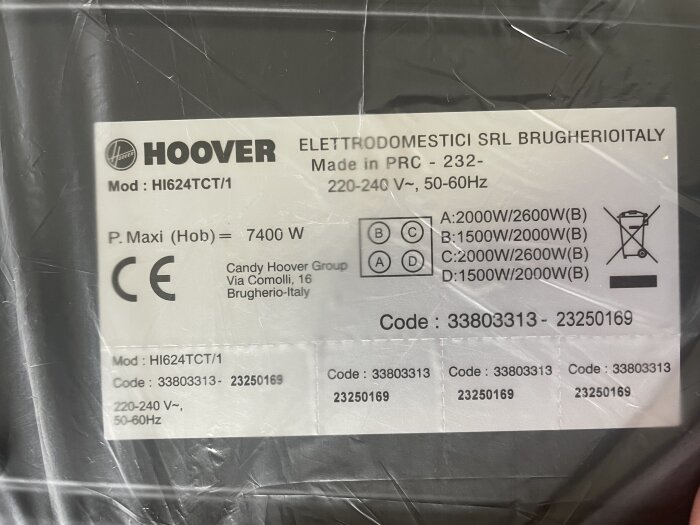 Etikett för Hoover-produkt, elektriska specifikationer, energiklassning, tillverkad i PRC, italiensk adress.