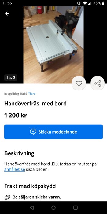 En handöverfräs med bord till salu för 1200 kronor, saknar en mutter.