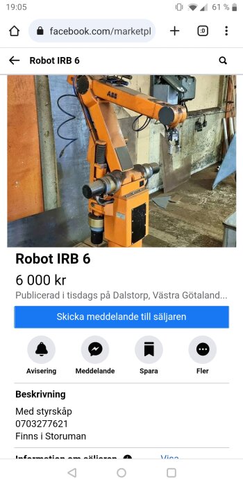 Orange industrirobot av märket ABB, modell IRB 6, till salu på onlineannonssida.