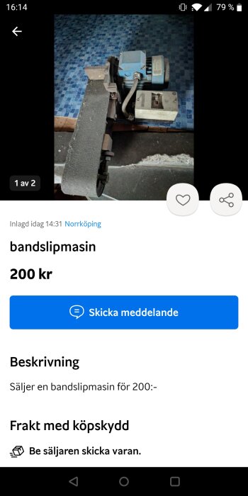 Begagnad bandslipmaskin till salu, blått golv i bakgrunden, annonserad för 200 kronor.