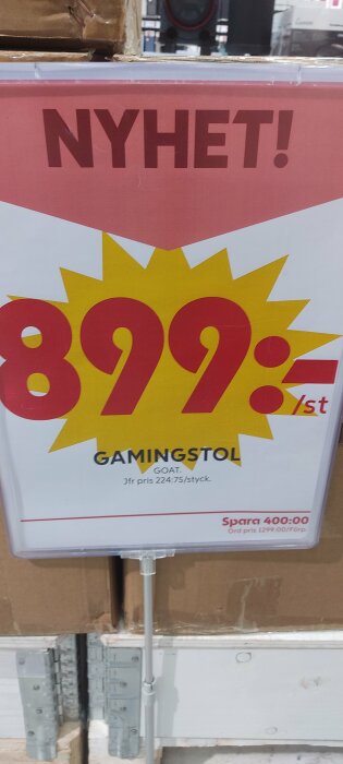 Erbjudande om gamingstol för 899 SEK, ordinarie pris 1299 SEK, sparar 400 SEK, stor gul procenttecken.