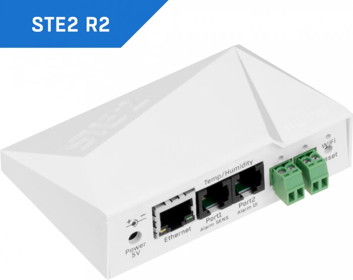 Vit nätverksenhet med etiketten "STE2 R2", Ethernet-portar, temperatur-/fuktighetssensor-ingångar och Wi-Fi-funktionalitet.