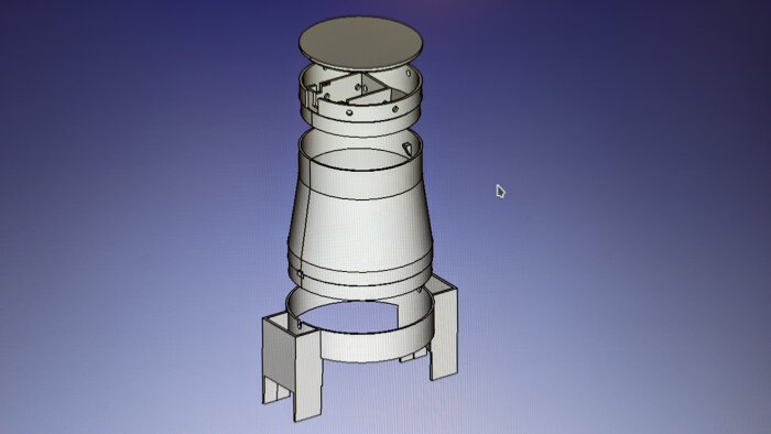 3D-modell av cylindriskt föremål med stödben, troligen teknisk ritning eller konstruktion, skärmad uppifrån.