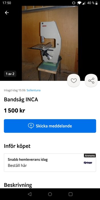 En bandågssåg, INCA-märke, till salu för 1500 kr, bakgrund med trävägg, produktplacering i ett garage.