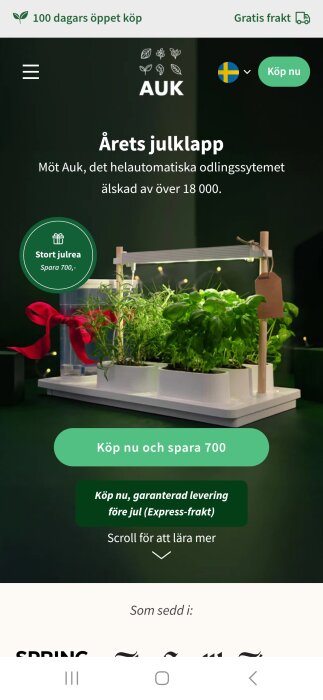 Automatiserat odlingsystem med gröna växter, reklam, rabatterbjudande, jultema, online shopping, "Årets julklapp" text.