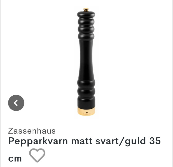 Svart och guld pepparkvarn, designad av Zassenhaus, mäter 35 cm i höjd.