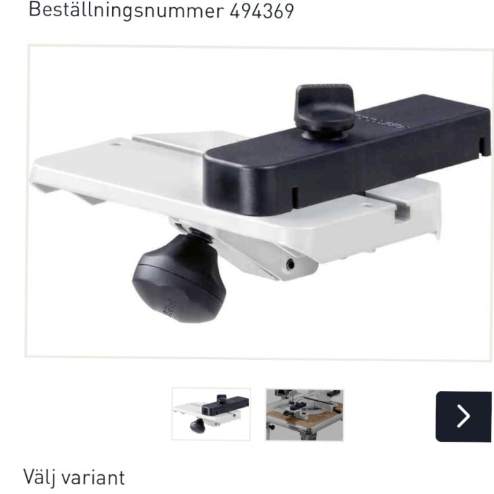 Vit och svart maskinell komponent med ratt och nummer 494369, möjligtvis industriell utrustning.