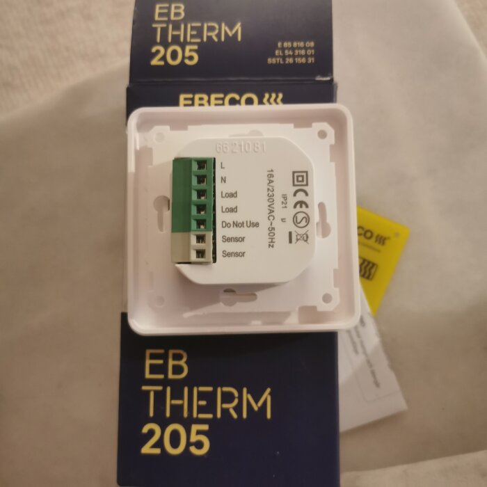 EB-Therm 205 termostat för uppvärmningssystem, ny i förpackning, elektriska anslutningar synliga.