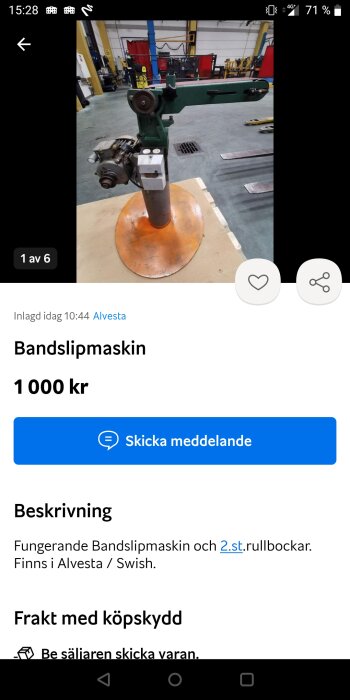 En bandslipmaskin i en verkstad, till salu för 1000 kronor, plats Alvesta.