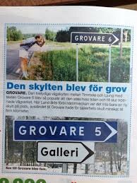 Artikel om vägskyltar överväxta av grönska med en bild och två skyltexempel: "GROVARE 6" och "GROVARE 5".