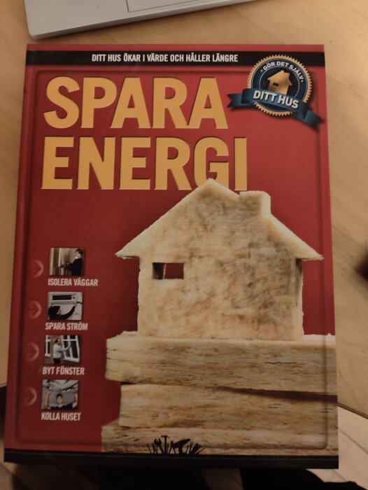 Tidning med titeln "SPARA ENERGI", tips om att öka husets värde, isolera, spara ström, byta fönster, kontrollera huset.