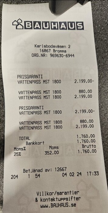 Kvitto från BAUHAUS, köp av vattenpass, total 1760 kronor, betalat med kort.