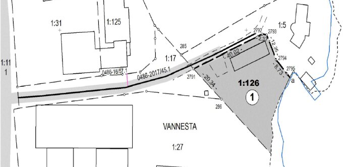 En del av en detaljplan med fastighetsgränser, byggnader och måttenheter, märkt med "VANNESTA".