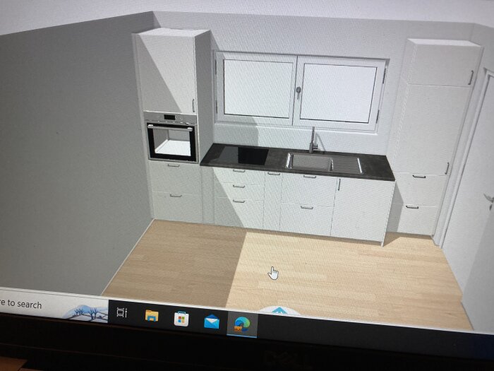 3D-ritning av kök med skåp, ugn, mikrovågsugn och diskbänk, visad på datorskärm.