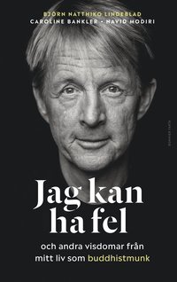 Omslagsbild på boken "Jag kan ha fel" med porträtt av en man och titeln i vit text.