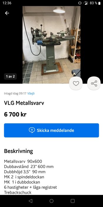 Metallsvets monterad i verkstad med tillhörande specifikationer på skärm.