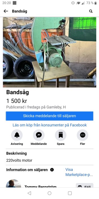 Bandsåg till salu för 1 500 kr i ett garage med grönt fönster i bakgrunden.