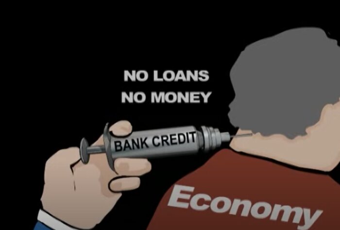 Illustration av en spruta märkt "BANK CREDIT" injicerad i "Economy", text "NO LOANS NO MONEY".