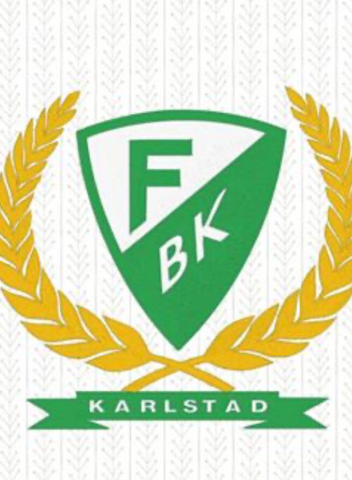 Logotyp för Farsta BK med sköld, bokstäverna "FBK" och texten "Karlstad" omgiven av två gyllene lagerkransar.