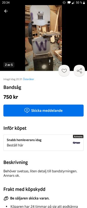 Begagnad bandsåg i verkstadsmiljö med markerad "W" på locket, behöver svetsning.