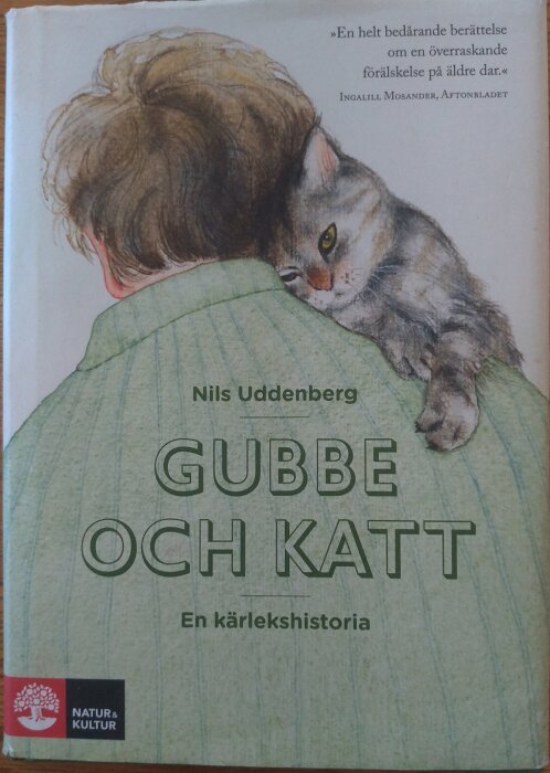 Omslag till boken "Gubbe och katt" av Nils Uddenberg med illustration av en person och en katt som kramas.