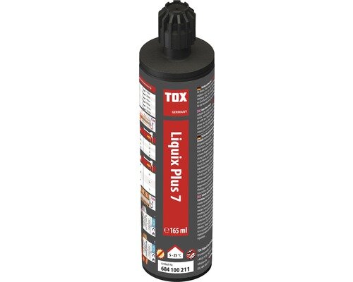 Flaska med TOX Liquid PLUS 7, ett härdande fyllmedel för reparationer.