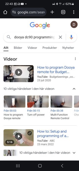 Screenshot av en Google-sökning efter "dooya dc90 programming" med videoresultat och tutorials på hur man programmerar Dooya-fjärrkontrollen.