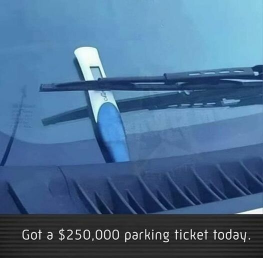 Ett graviditetstest ligger under vindrutetorkaren på en bil med texten "Got a $250,000 parking ticket today.