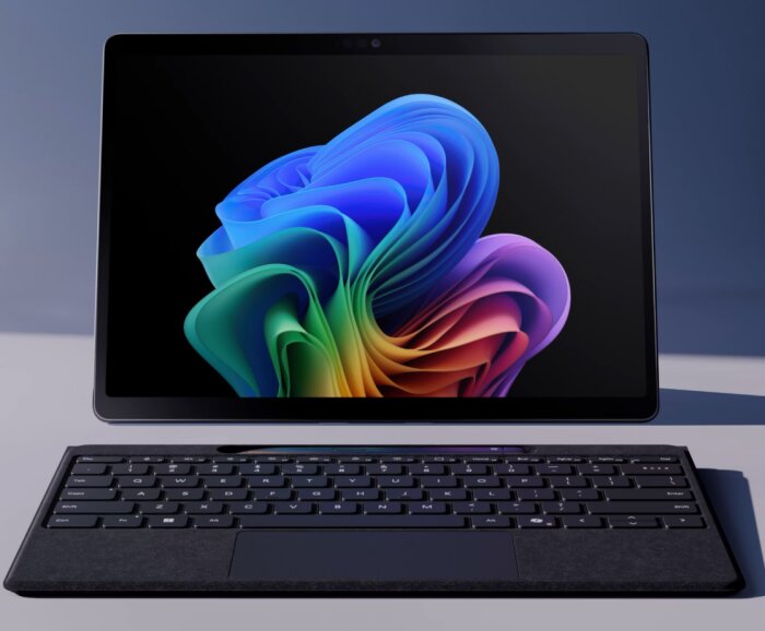 Surface Pro 11th Edition med löstagbart tangentbord och färgglad skärmsläckare.