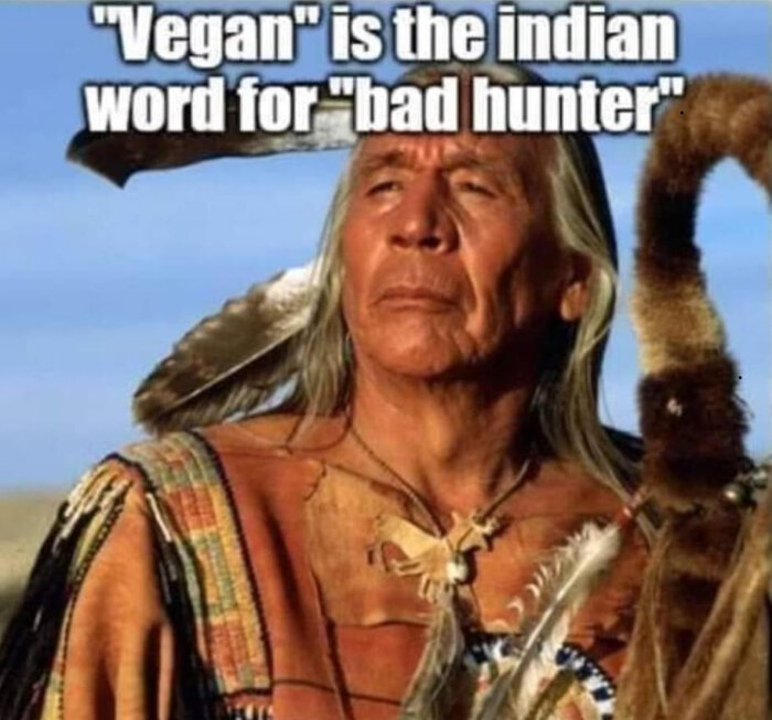 Äldre man i traditionella indian-kläder med texten "Vegan is the indian word for bad hunter" över bilden.