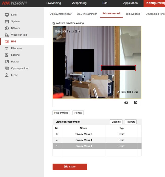Hikvision kameraanvändargränssnitt med två svarta sekretessmasker över en övervakningsbild och lista över sekretessmasker i konfigurering.