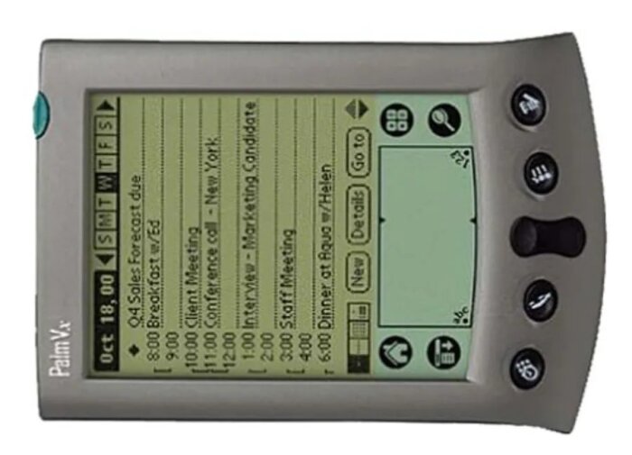 PalmPilot-handdator med en synkroniserad Outlook-kalender från år 2000, inklusive möteslistor och knappar för navigation och funktioner.