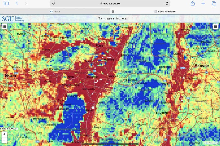 Karta som visar gamma-strålning, inklusive uran, runt Billingen och Skövde, med högre strålningsnivåer markerade i rött och lägre nivåer i blått.