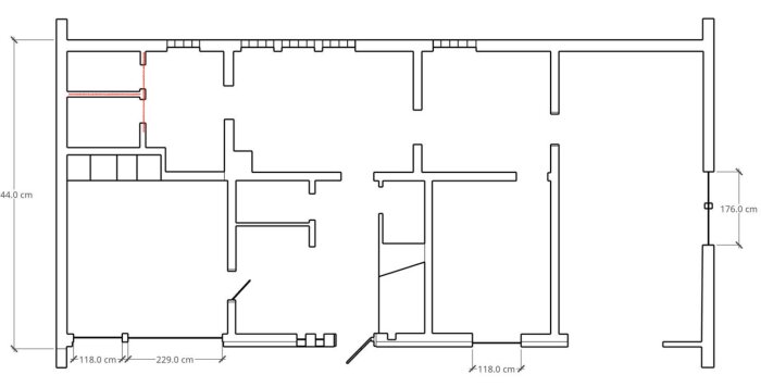 Planritning av källarvåning med väggar markerade i rött som rivits för att omvandla pannrum och förråd till badrum. Rumsmått anges i centimeter.