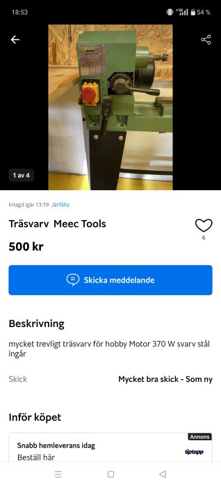 Grön Meec Tools träsvarv med röd/gul startknapp och svarta vred på vänster sida, monterad på svart stativ.