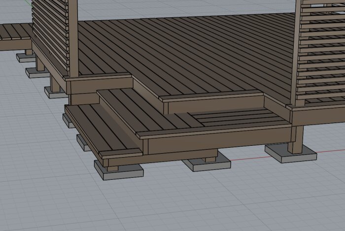Byggprojektbild som visar en altan med steg och fundament för bärande balkar.