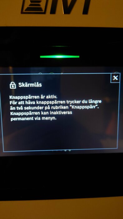 IVT GEO 612 display visar meddelande om skärmlås: "För att häva knappsparren tryck längre än två sekunder på rubriken 'Knappsparr'. Permanenta inställningar i menyn.