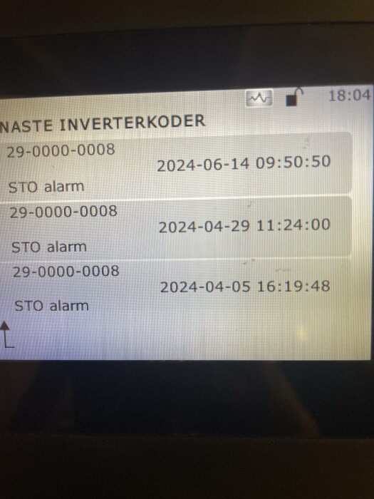 Skärm med larmhistorik som visar flera "STO alarm" med datum och tid för varje incident.