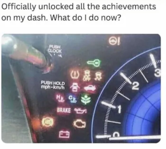 Instrumentpanel med många tända varningslampor och text: "Officially unlocked all the achievements on my dash. What do I do now?