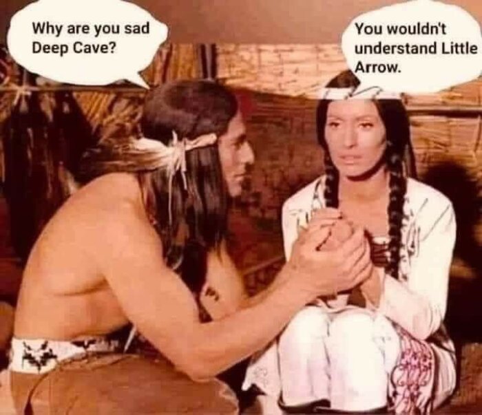 Två personer klädda som indianer i tält, pratbubblor: "Varför är du ledsen, Djupe Grotta?" och "Du skulle inte förstå, Lille Pil.