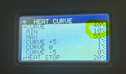 Display showing heat pump settings with heat curve options, including minimum and maximum temperatures and heat stop adjustment for maintaining basement warmth.