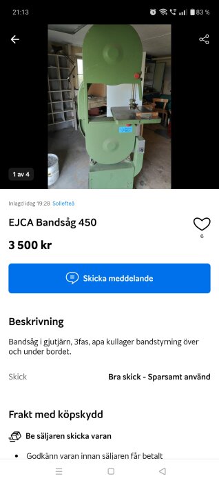 Grön bandsåg märkt EJCA 450 placerad i ett verkstadsutrymme med hyllor i bakgrunden och en vit hink på golvet.